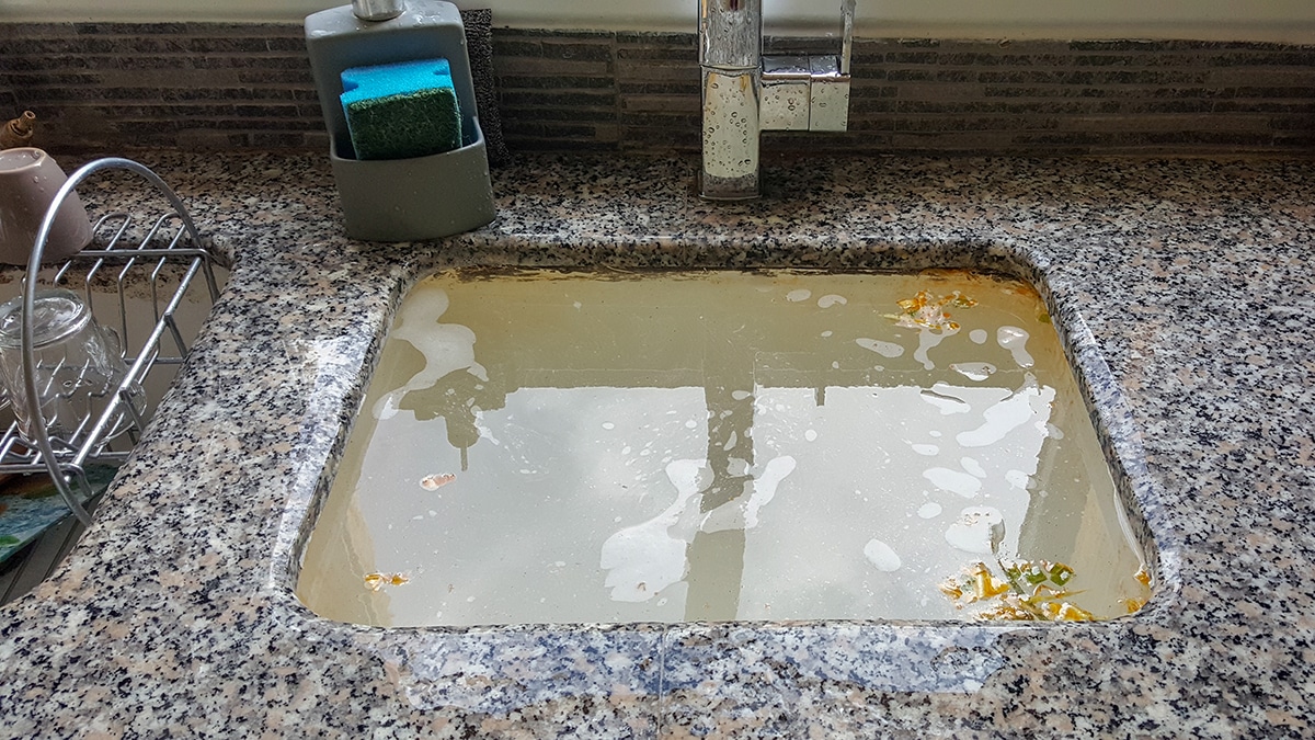 new kitchen sink not draining properly